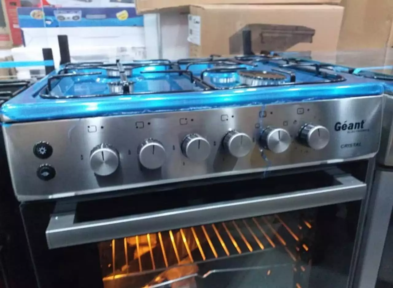 Cuisiniere inox 4 feux Geant كويزينيار جيون